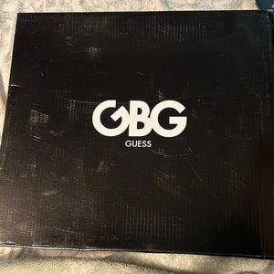 GBG Guess size 6.5  color black and like a copper